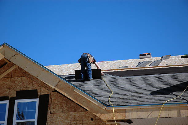 Roofing team at work